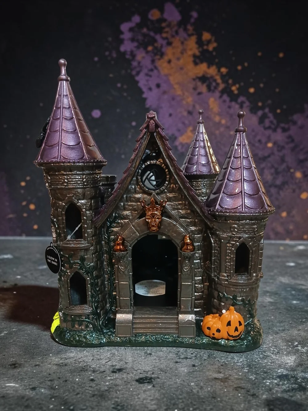 Haunted Castle Halloween Luminary with Purple Roofs and Orange Pumpkins